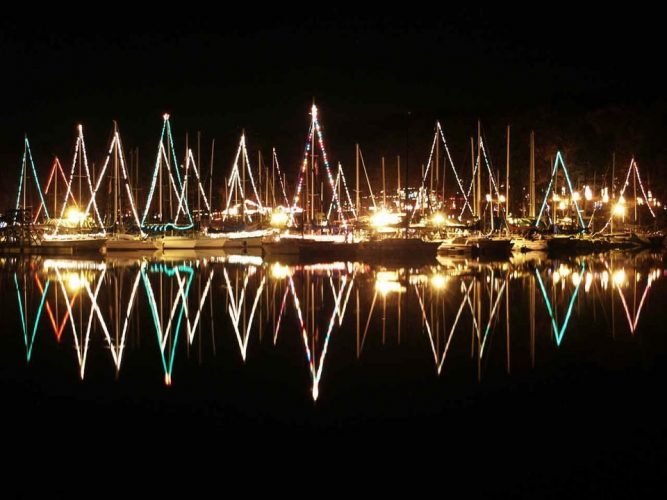 boats with holiday lights and decorations